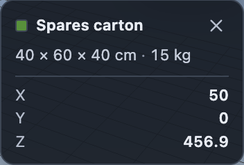 The selection card: a green swatch, the name Spares carton, the size 40 by 60 by 40 cm and 15 kg, and coordinates X 60, Y 160, Z 0.